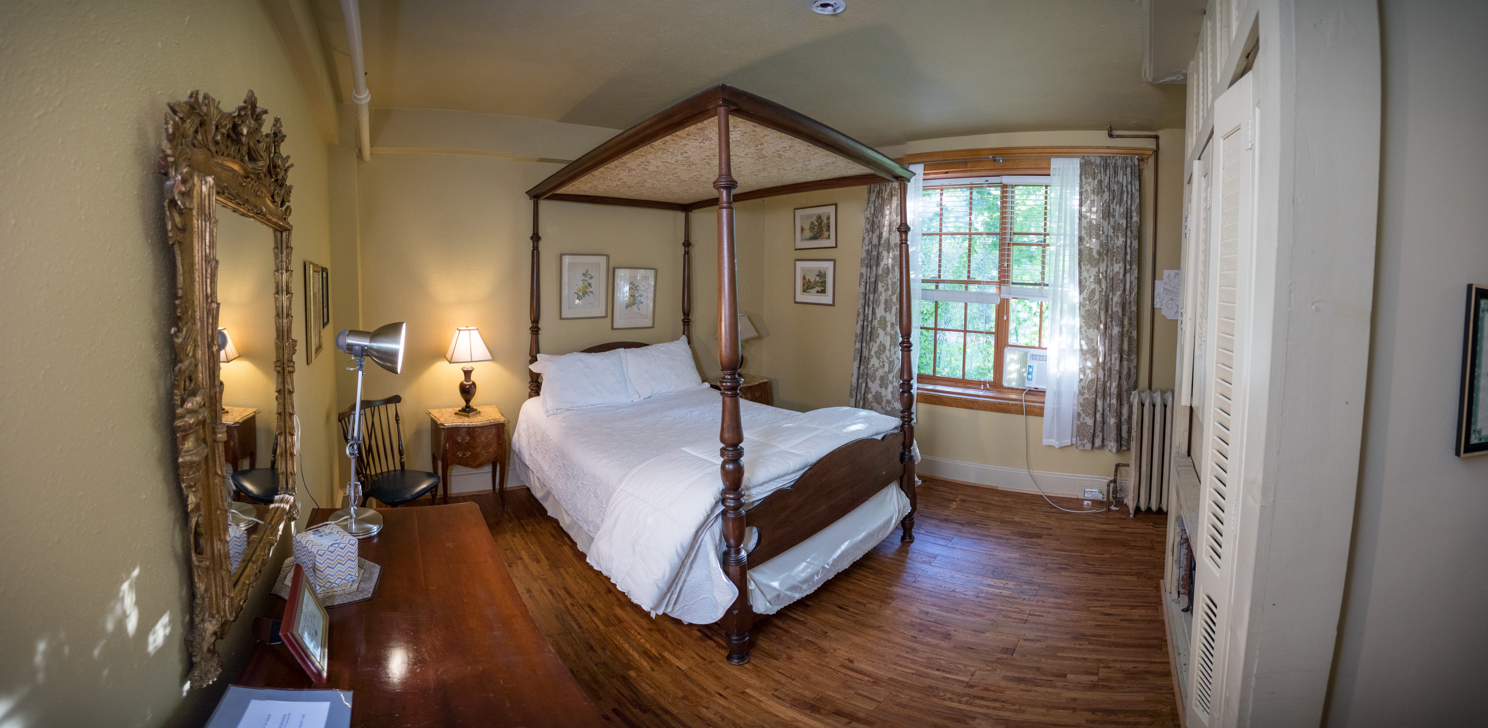 Amelia Earhart bedroom with four post queen bed with canopy