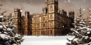 Postcard of Downton abbey in winter.